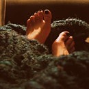 woman feet with blanket