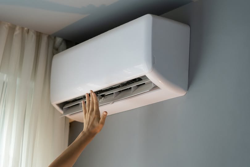 Aire One technician working on a residential cooling system